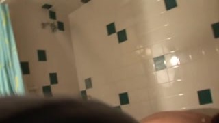 Hand Lotion Studios - Busty mature soaping up in the shower and rubbing clit